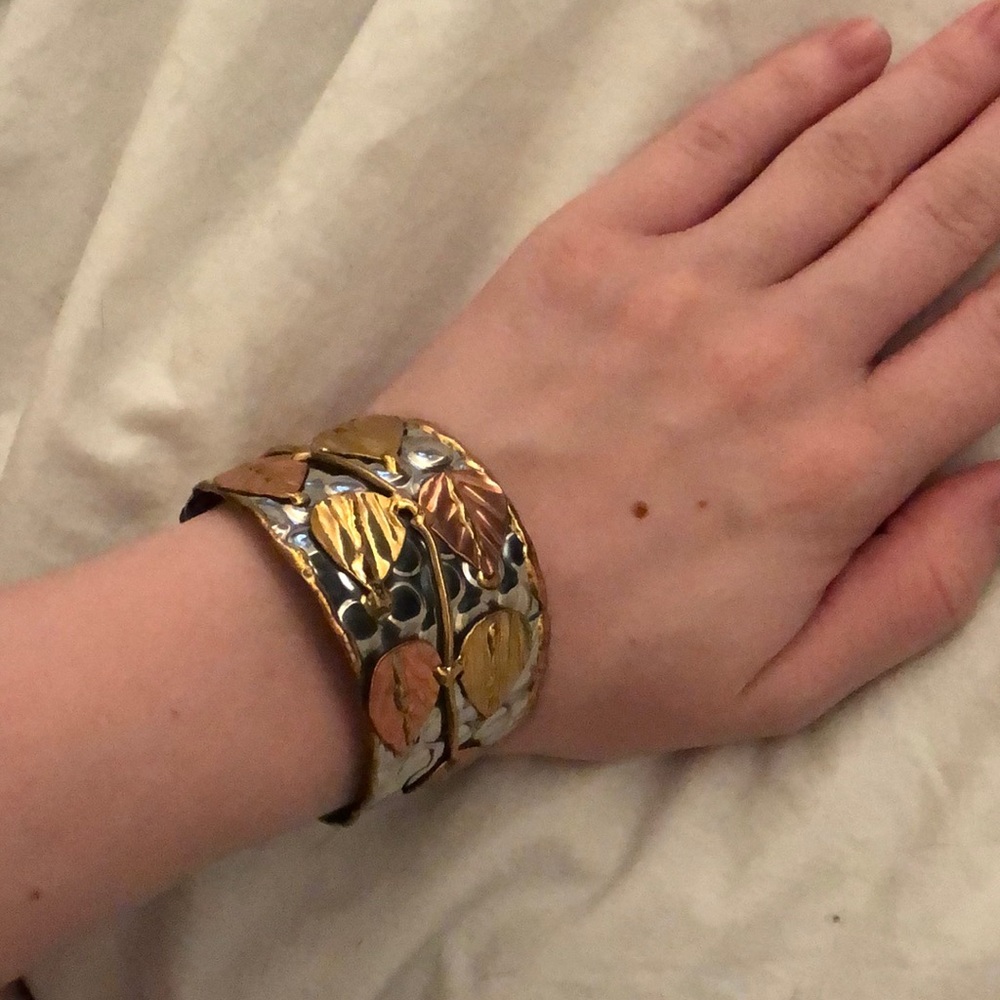 Gold, silver and brass hammered bangle